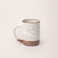 The Mug, Jeune femme le visage enfoui dans les bras